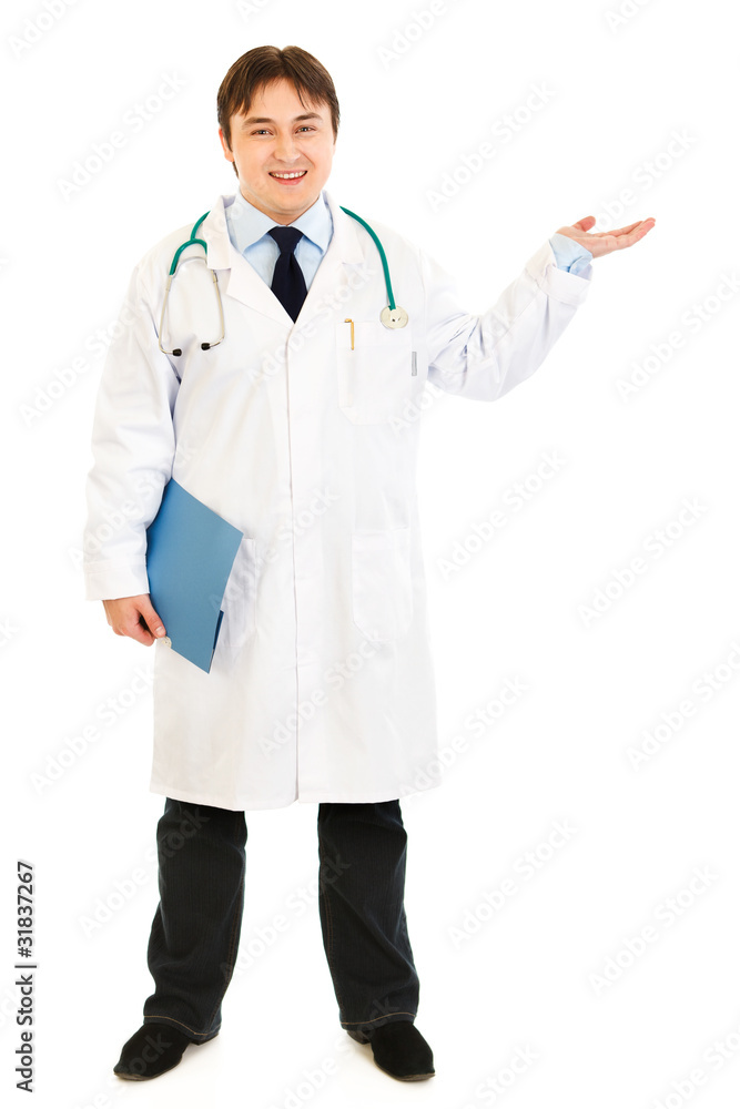Doctor holding medical chart and presenting something on hand Doctor holding medical chart and presenting something on hand