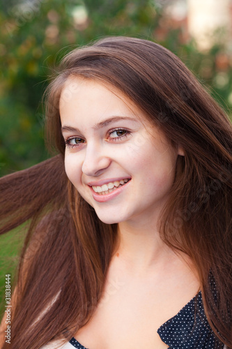 portrait of a beautiful young woman outdoor © Evgeniya Uvarova