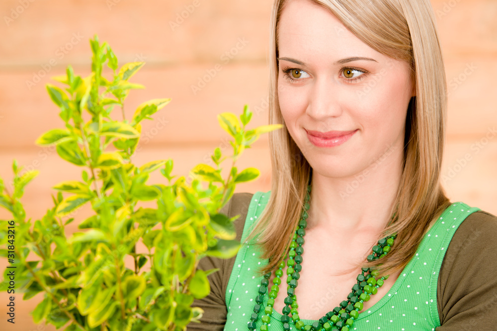 Portrait happy woman hold plant spring gardening Portrait happy woman hold plant spring gardening