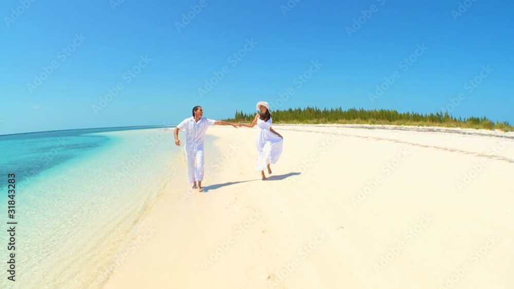 Caucasian Couple on Luxury Island Vacation Caucasian Couple on Luxury Island Vacation