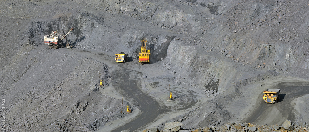Panorama of an open-cast mine extracting iron ore Panorama of an open-cast mine extracting iron ore