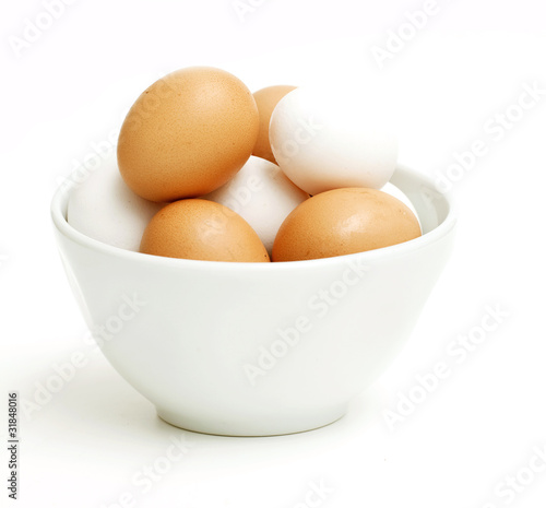 bowl with white and yellow eggs