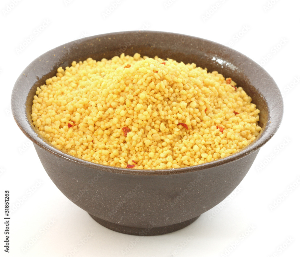 Brown bowl with couscous on white background Brown bowl with couscous on white background