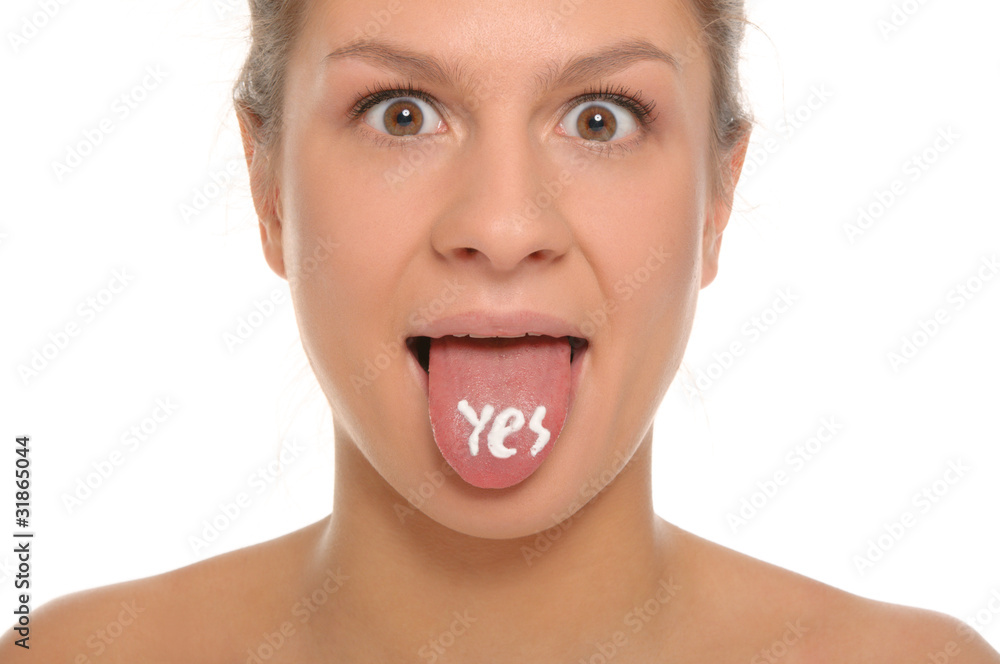 Woman puts out the tongue with an inscription yes Woman puts out the tongue with an inscription yes