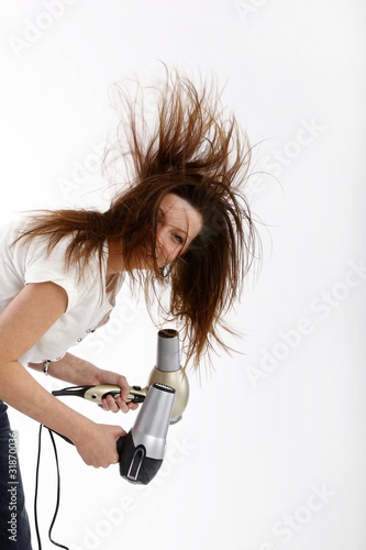 young beauty with two hairdryer