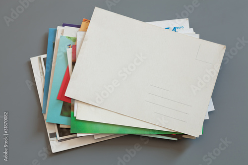 Pile of colorful cards on gray background