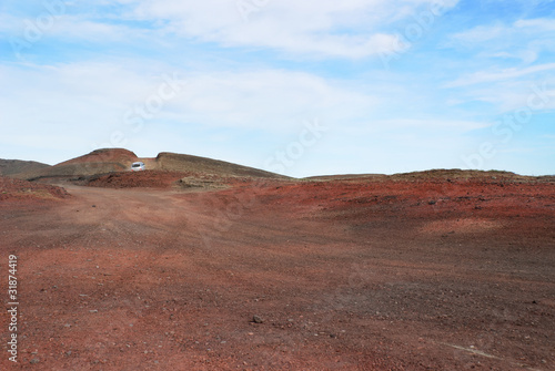 terra rossa nelle vicinanze di Dettifoss in Islanda photo