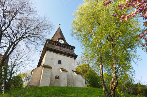 Bell tower of the church of Avas photo
