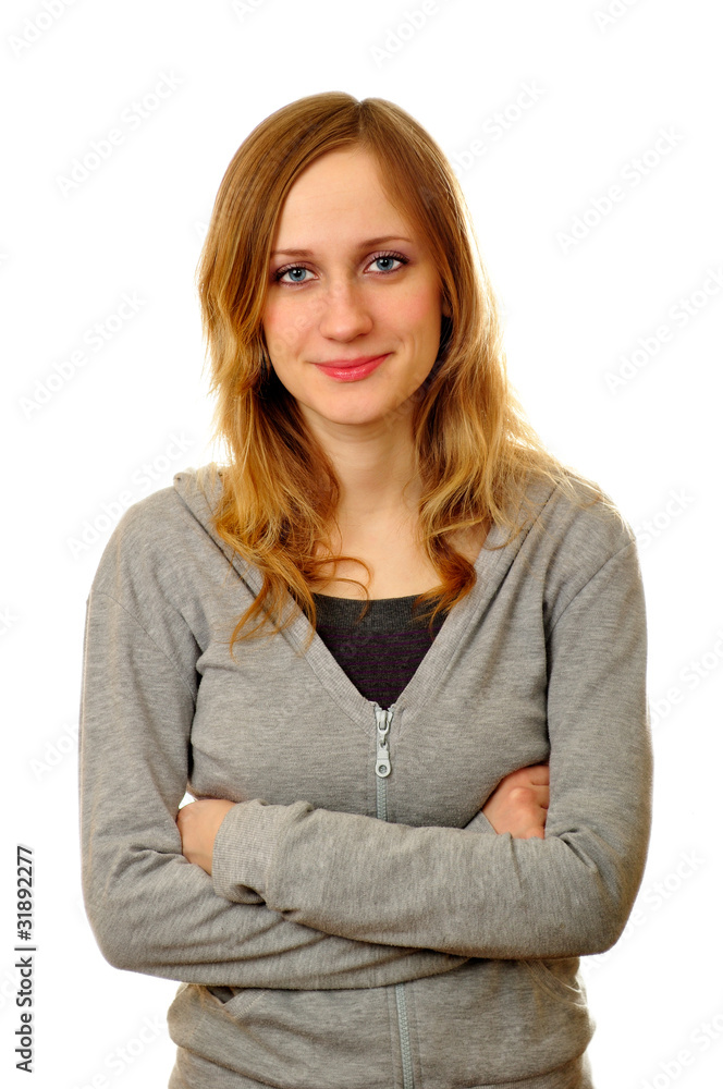 Confident woman with arms crossed against a white background Confident woman with arms crossed against a white background
