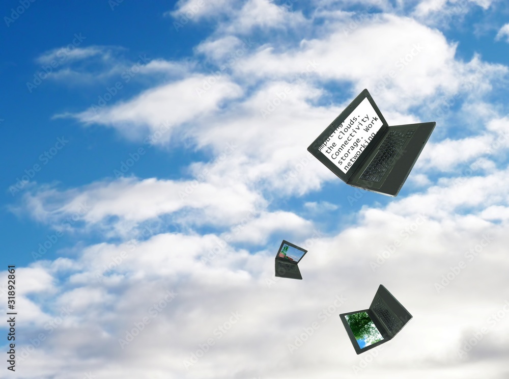 Cloud computing: laptop computers floating in the clouds Cloud computing: laptop computers floating in the clouds