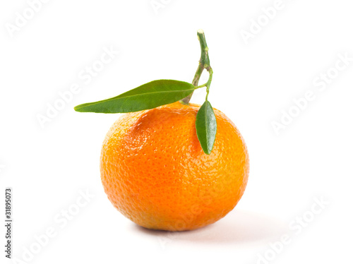 Mandarin orange with leaves on a white background