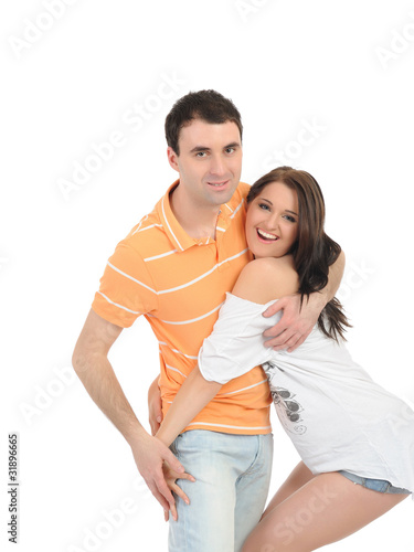 sweet young summer couple in love having fun. isolated