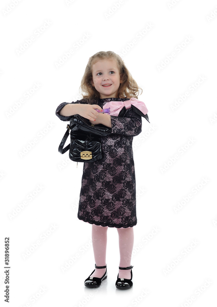 Pretty little child girl in black elegant party dress with lipst Pretty little child girl in black elegant party dress with lipst