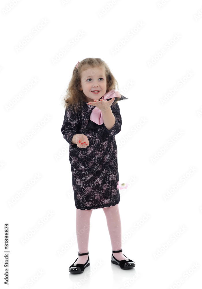 Pretty little child girl in black elegant party dress. isolated Pretty little child girl in black elegant party dress. isolated