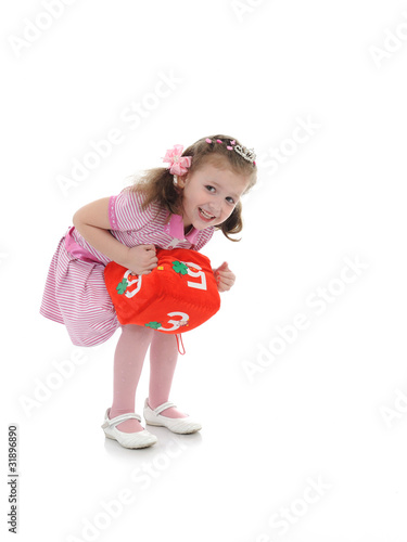 Pretty little princess girl in pink dress. isolated