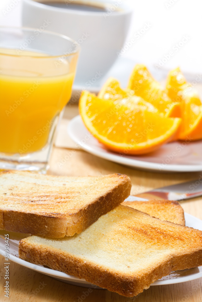 breakfast with toasts and orange breakfast with toasts and orange