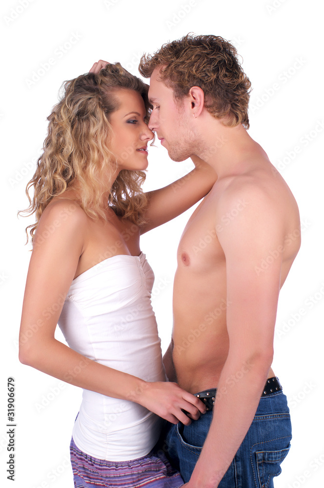 Beautiful young semi-dressed couple in love Beautiful young semi-dressed couple in love