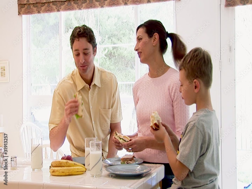 Family eating lunch together