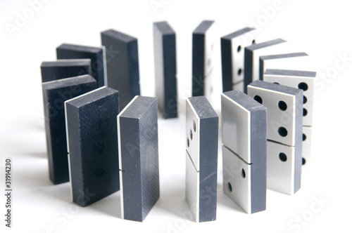 Pieces of domino n a circle. Columns from domino