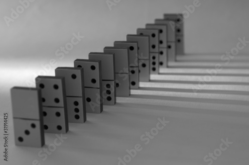 Black and white dominos with shadows
