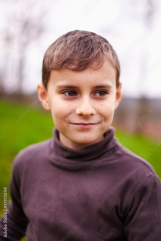 Happy child outdoor, selective focus Happy child outdoor, selective focus
