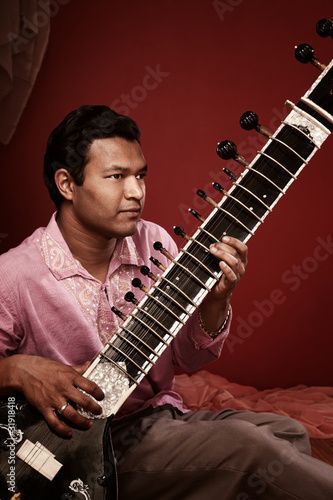 Indian Man Playing Sitar