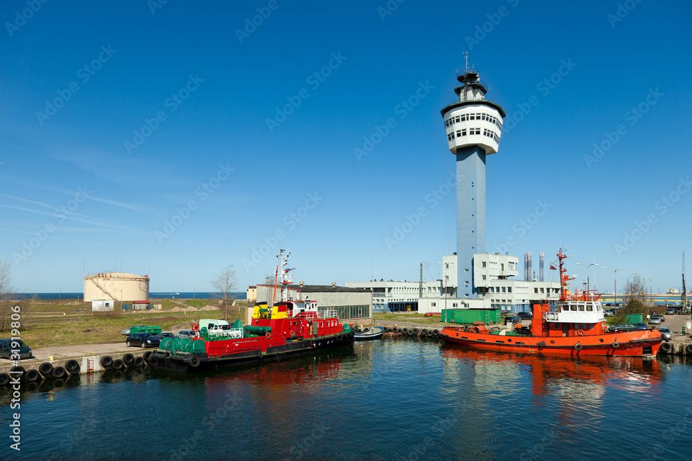 A port with tugboats and fireboat.