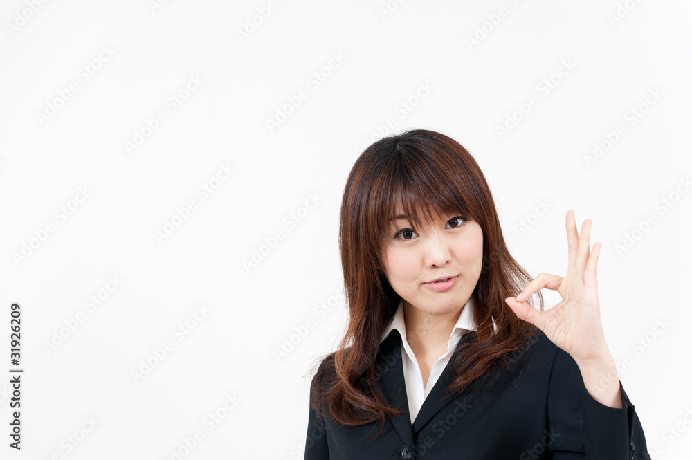 beautiful asian businesswoman showing okay sign