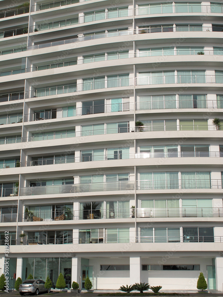 Apartment building showing lots of windows Apartment building showing lots of windows