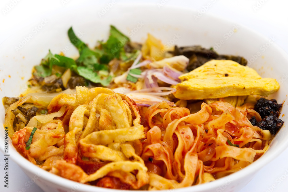 Traditional egg noodle with chicken curry