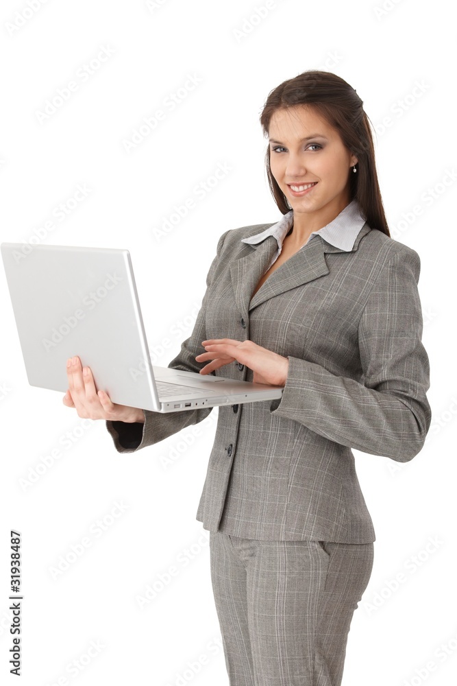 Pretty businesswoman working on laptop Pretty businesswoman working on laptop