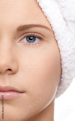 half face shoot of girl with towel