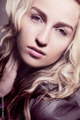 Beautiful woman with long curly hair.