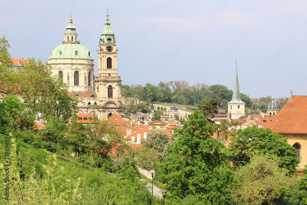 Spring Prague St. Nicholas' Cathedral with the green Nature