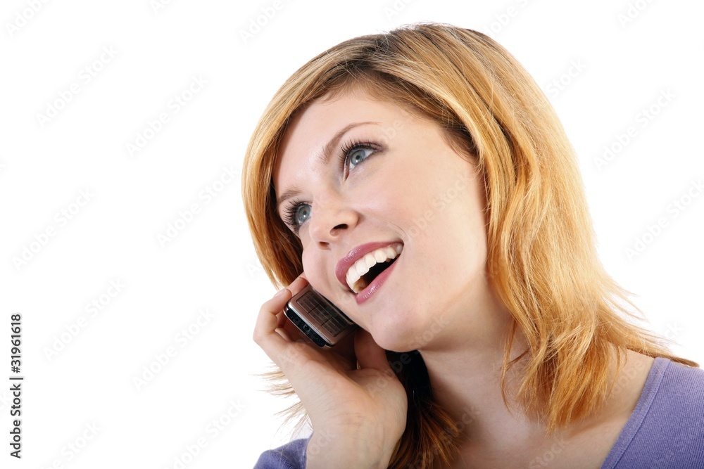 Blond young woman with a mobile phone (white background) Blond young woman with a mobile phone (white background)