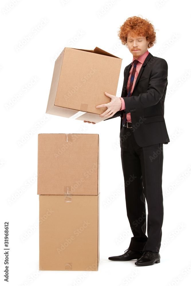 attractive businessman with big boxes attractive businessman with big boxes