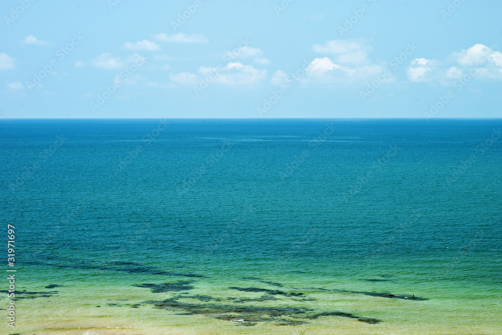 Sand beach ,sea and blue sky