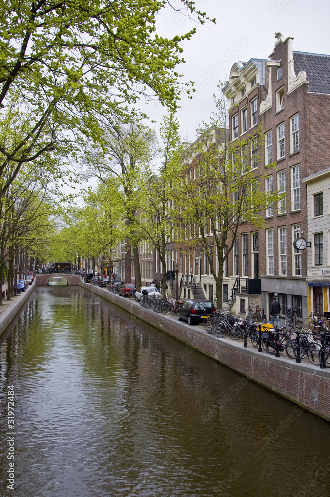 Canal in Amsterdam. Spring cityscape.