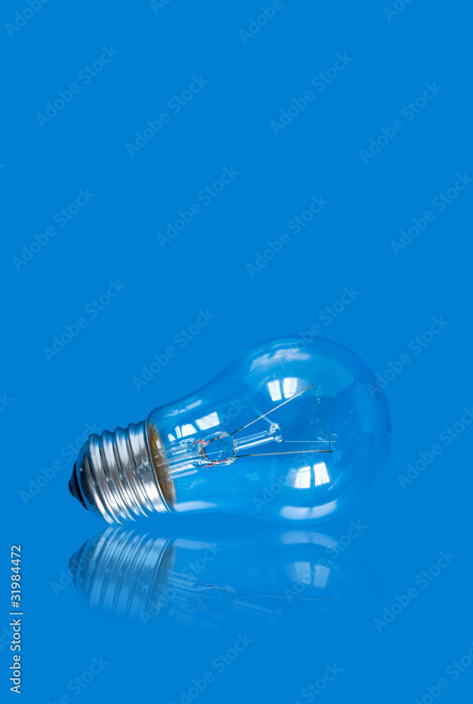 lightbulb on blue background with reflection lightbulb on blue background with reflection
