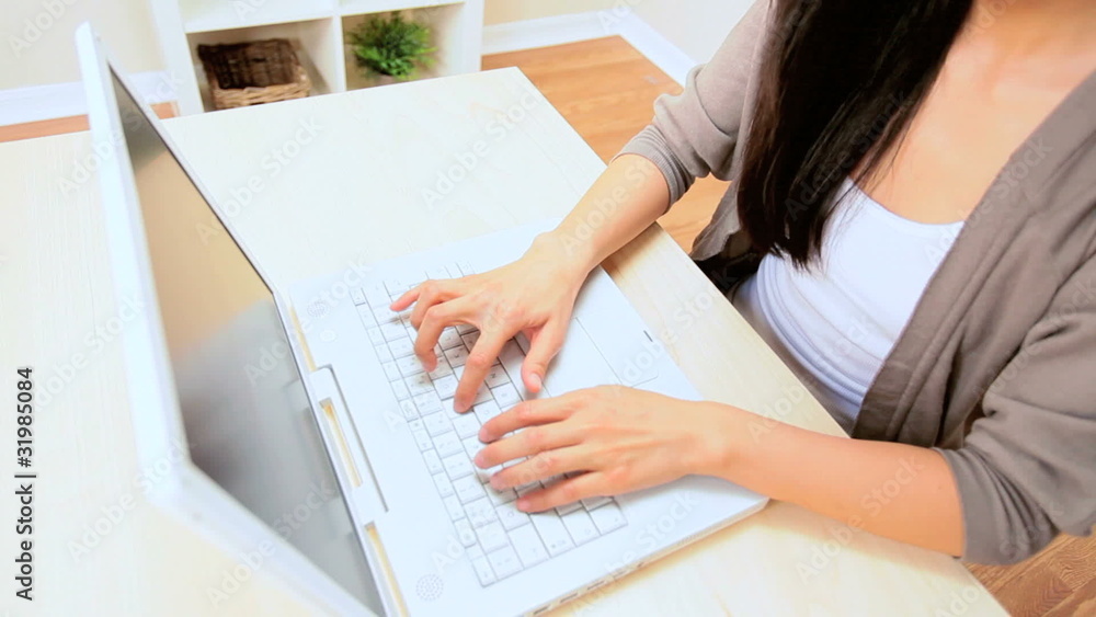 Young Girl Working on a Laptop Young Girl Working on a Laptop