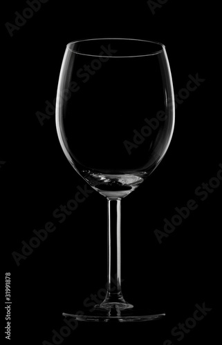 Silhouette of wine glass isolated on black
