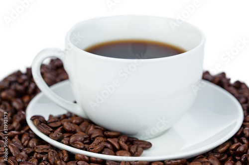 Cup of coffee and coffee beans © WavebreakMediaMicro