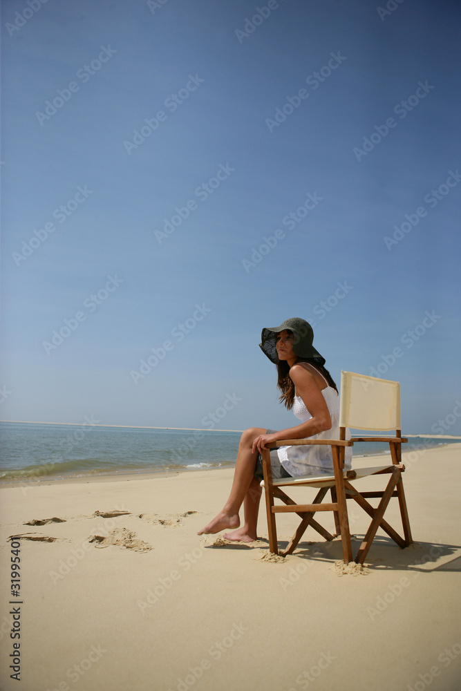 Woman sunbathing at the seaside