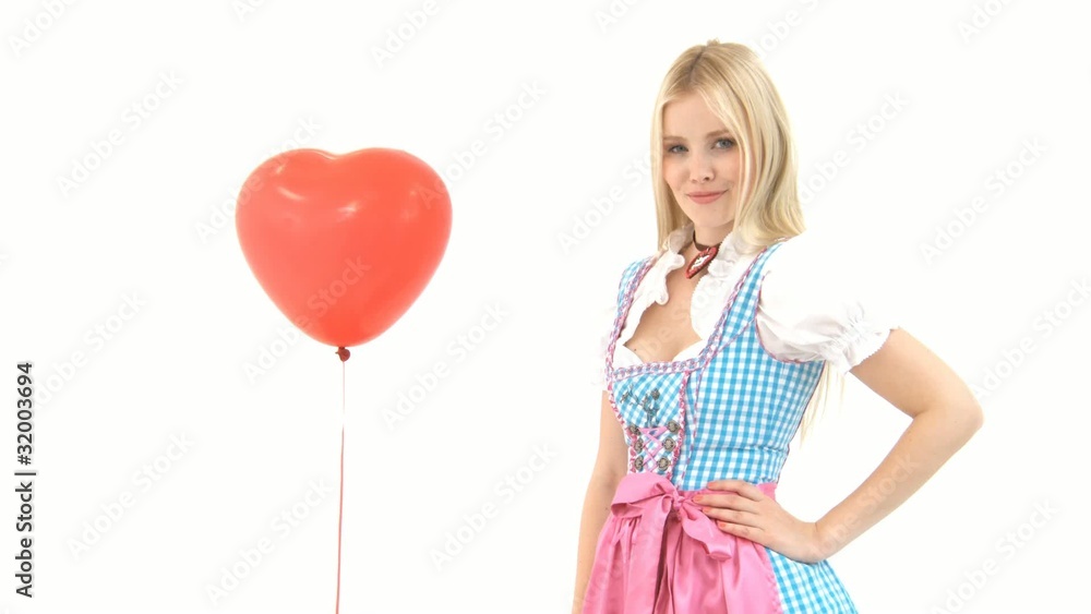 Frau im Dirndl mit Ballon Frau im Dirndl mit Ballon