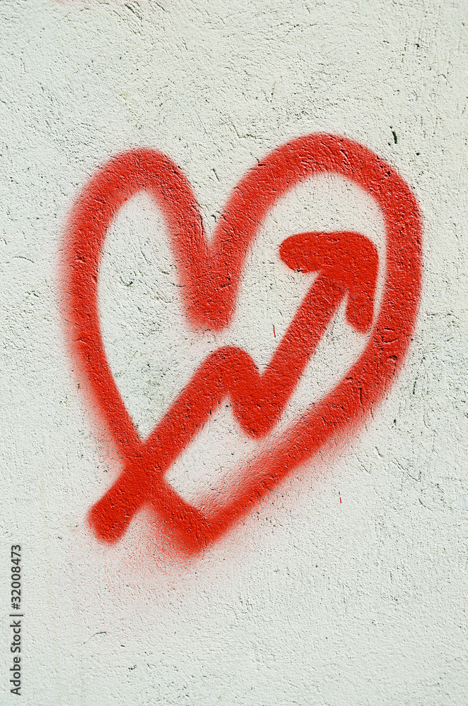 Red heart and cupid arrow Red heart and cupid arrow
