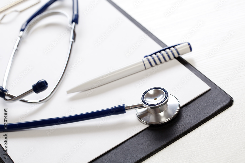Black clipboard with stethoscope. Medicine concept. Black clipboard with stethoscope. Medicine concept.