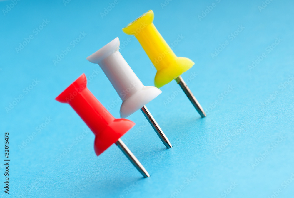 Office pins on the paper Office pins on the paper