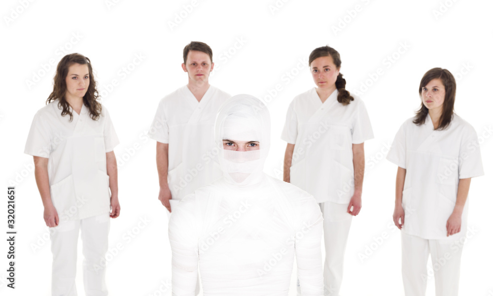 Patient in front of Healtcare Staff