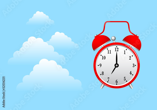 Alarm-clock on blue sky