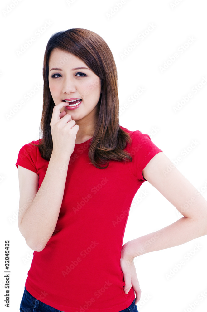 Beautiful young woman biting her finger Beautiful young woman biting her finger